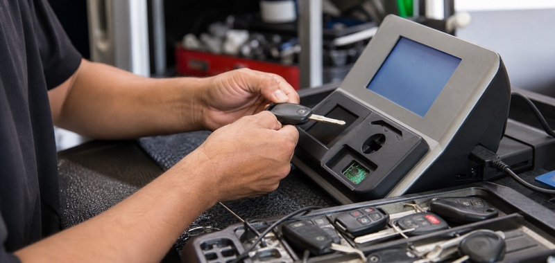 Transponder chip being programmed in Orlando, Florida.