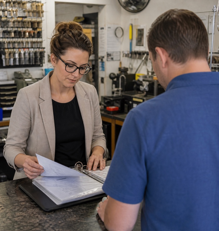 Property manager reviewing a portfolio service record in Orlando, Florida.